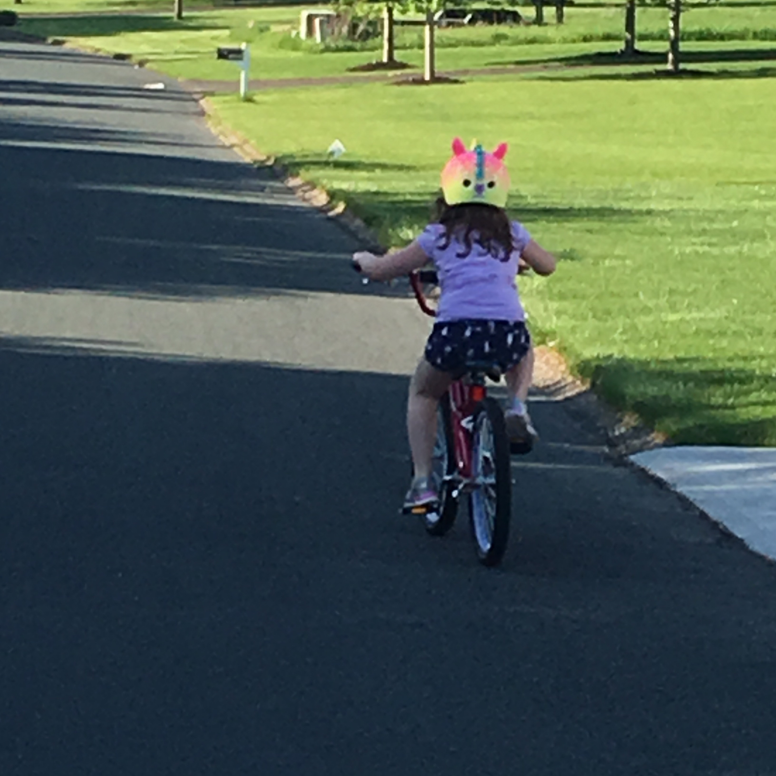 Peyton riding her bike